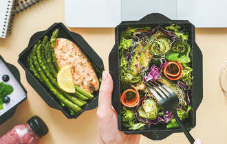 Female,Hands,Hold,Food,Delivery,Box,Having,Lunch,At,Work